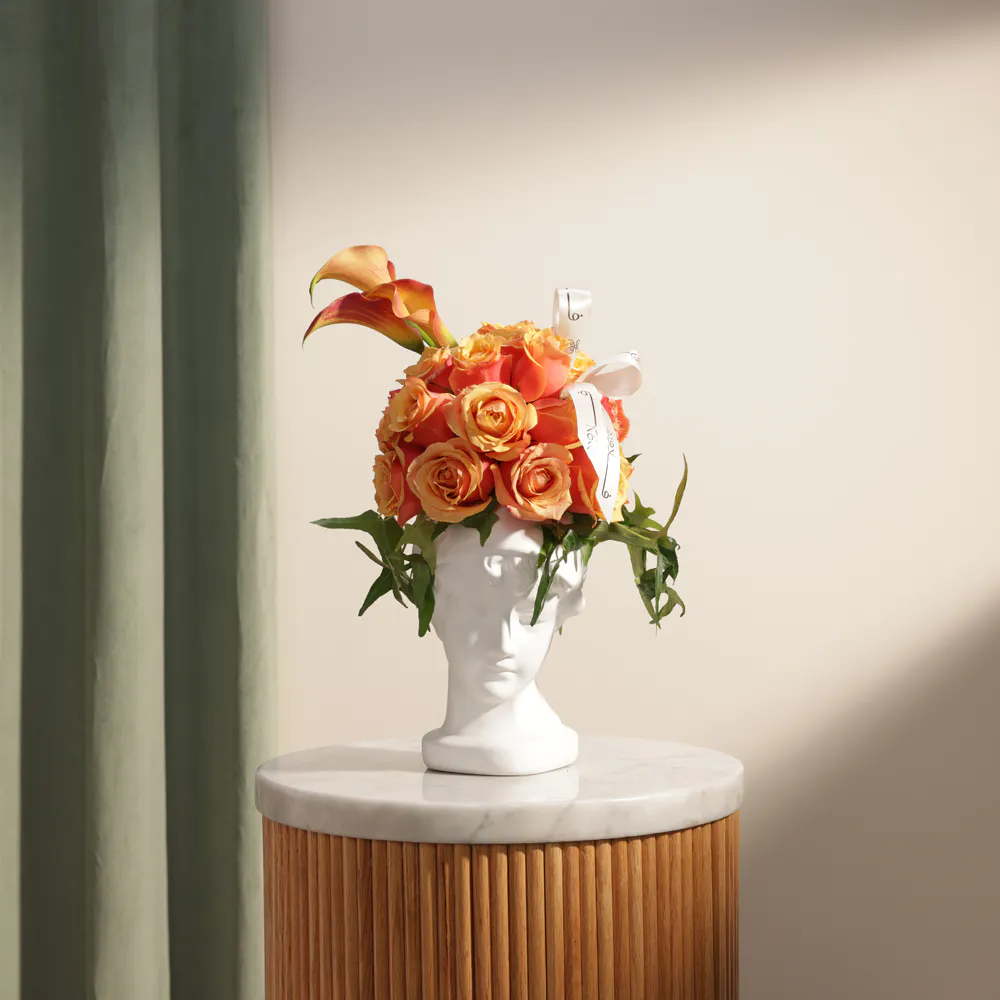 Buy and send Radiant Orange Aura Flower Vase gift Online in Riyadh