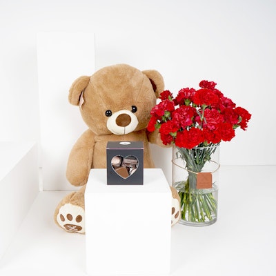 Medium Red Carnations Cylinder Vase with a Medium Teddy Bear and Medium Chocolate Box