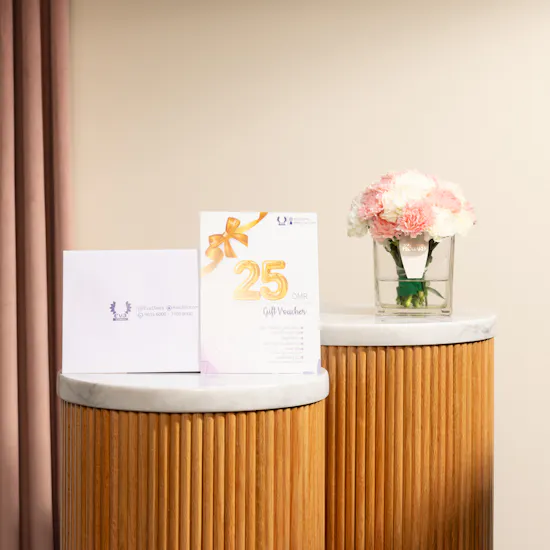Eva Clinic Voucher 25 OMR | Carnation Vase