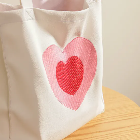 Glossy Touch White Leather Bag with Heart Design