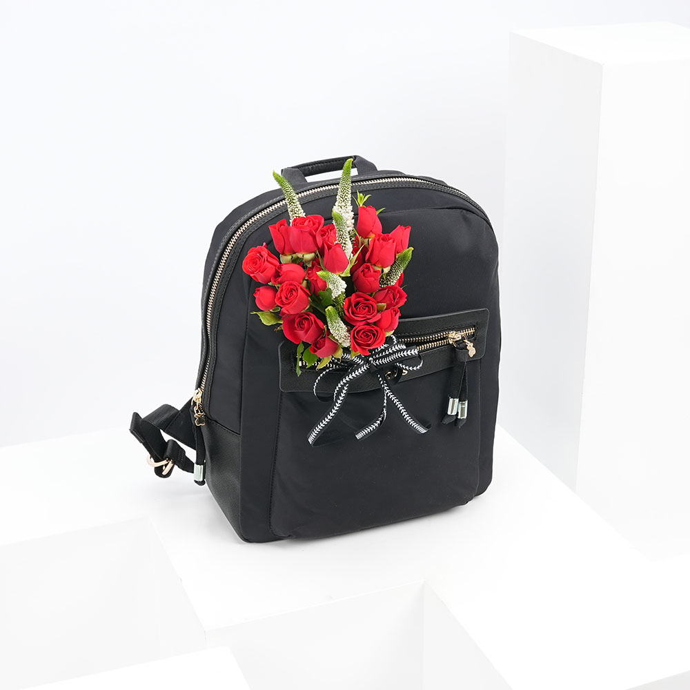 Black backpack shop with flowers