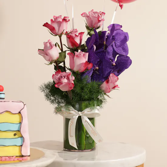 Floward Birthday Slice Comic Cake | Enchanting Flowers Vase and Balloons