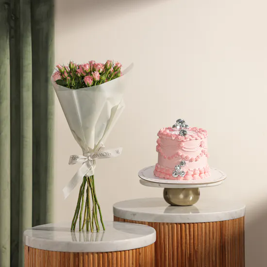 December Cake Pink Birthday Cake with Disco Balls | Delicate Flowers Bouquet
