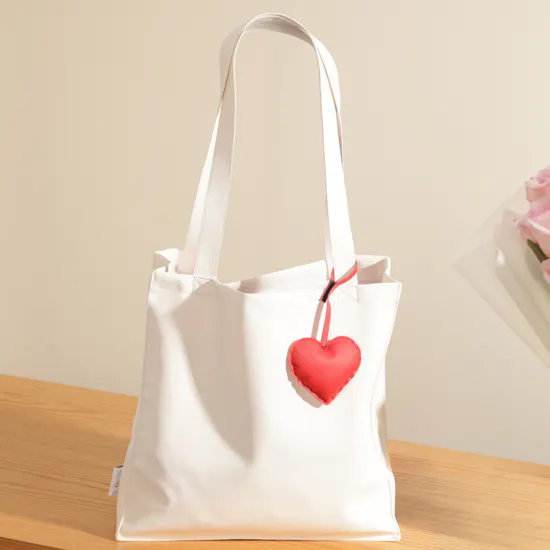 Glossy Touch White Leather Bag with Red Heart Charm | Opulent Flower