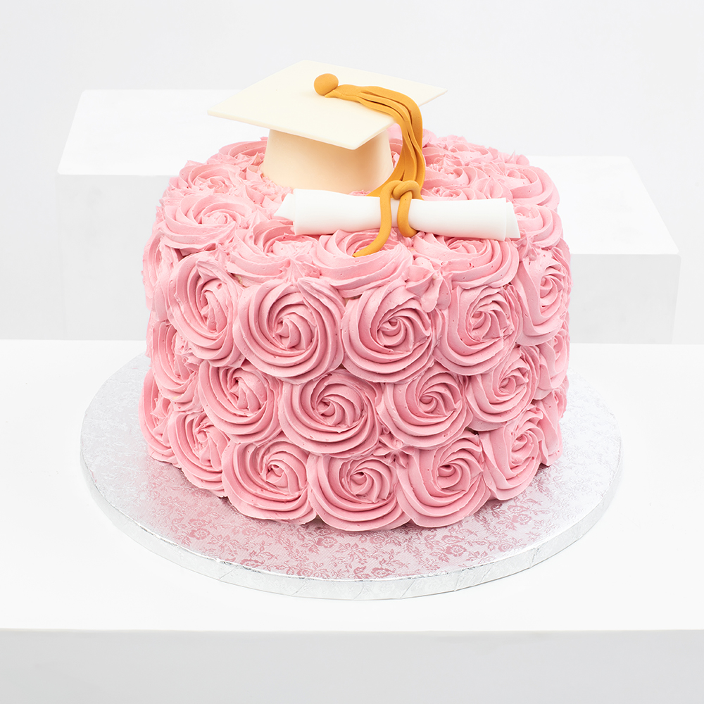 This weekend I made a cute pink graduation cake for a college graduate. I  love the combo of pink and gold. This was a big heavy cake even... |  Instagram