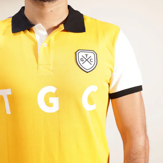 TGC Yellow Shield Polo Shirt