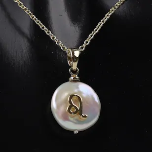 Leo Ash Couture Zodiac Necklace by Ash Couture | Gold Plated | Pearl Leo Ash Couture Zodiac Necklace by Ash Couture | Gold Plated | Pearl