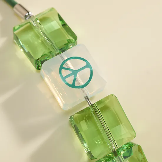 Swarovski Letra Peace Green Crystal Women's Bracelet