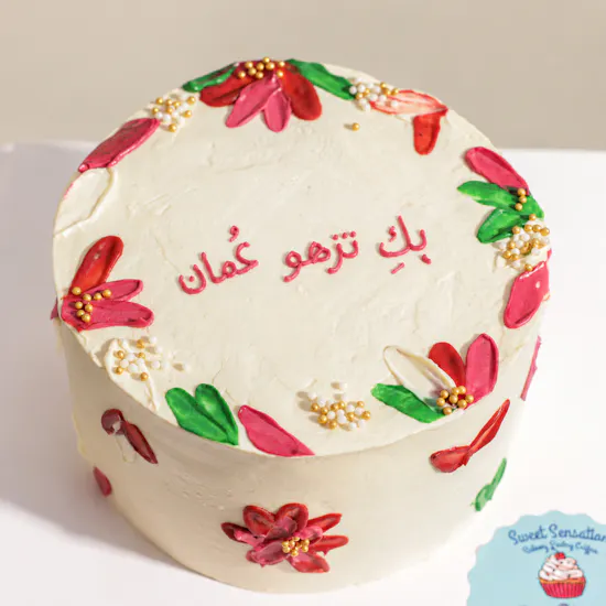 كيك يوم المرأة العمانية المزينة بالزهور من سويت سينسيشن