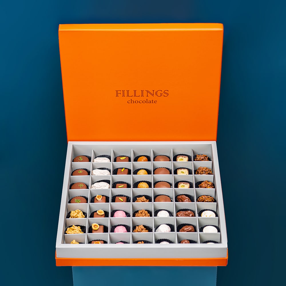  صندوق ​​شوكولاتة بريميوم متنوعة من فيلنقز جوكلت | 49 قطعة