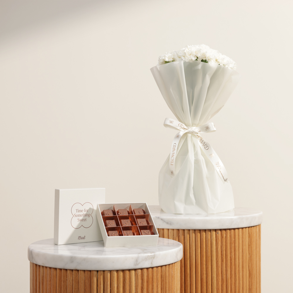 صندوق شوكولاتة مميز من فلاورد | باقة زهور السكون الذهبي