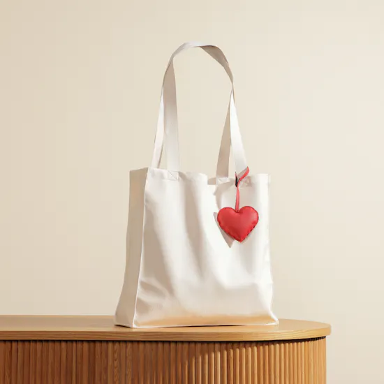 Glossy Touch White Leather Bag with Red Heart Charm