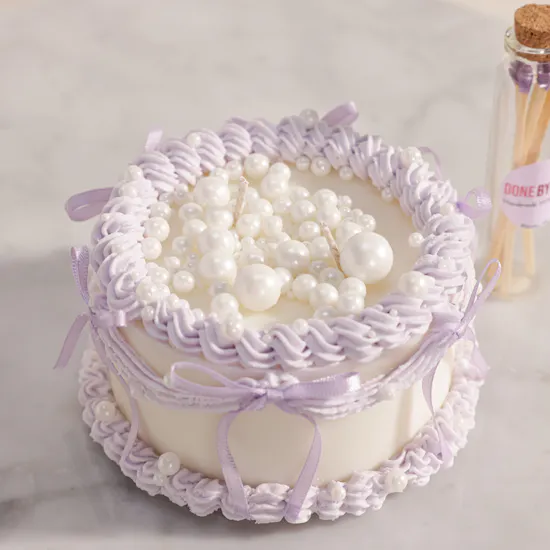 Done by SHK Purple Pearls Candle Cake