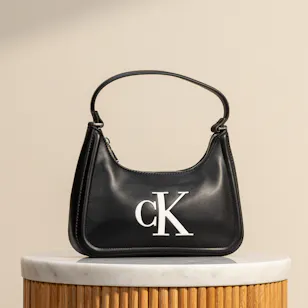 Calvin Klein Black Embossed Monogram Women’s Shoulder Bag Calvin Klein Black Embossed Monogram Women’s Shoulder Bag