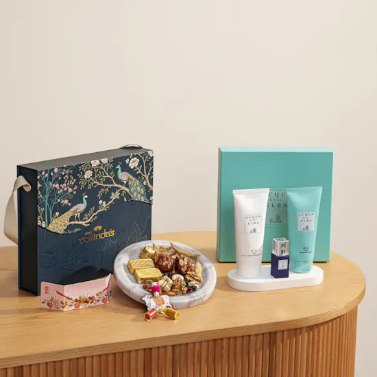 MyGovindas Rakhi Mixed Sweets Hamper | Acqua Dell'Elba Blu Gift Set for Men