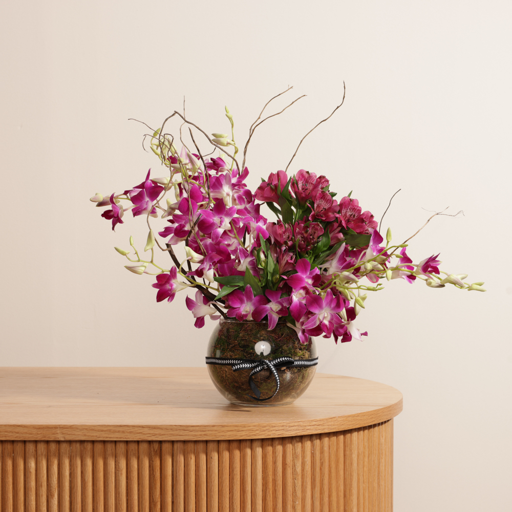 فازة زهور بنفسجية متألقة