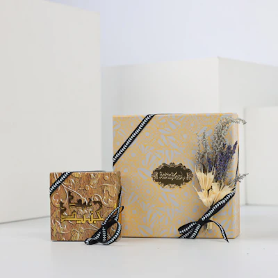 Junaid Badiah Gold and Oud Set | Flowers Junaid Badiah Gold and Oud Set | Flowers