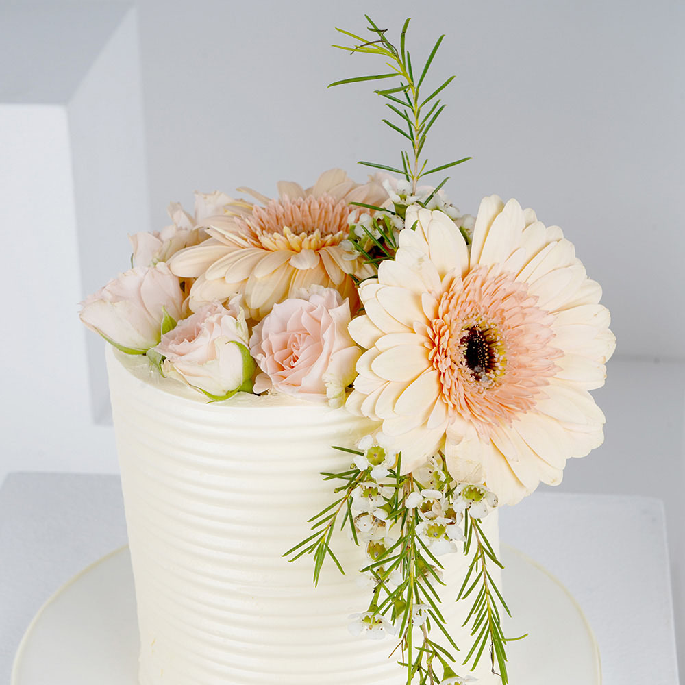 Gerber Daisy Buttercream And Fondant Ruffle Wedding Cake - CakeCentral.com