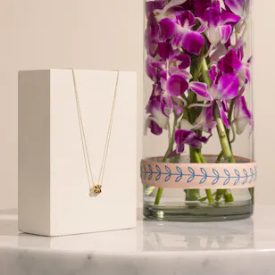 Siran by Iram Irregular Shaped Emerald Stones Necklace | Flowers Vase Siran by Iram Irregular Shaped Emerald Stones Necklace | Flowers Vase