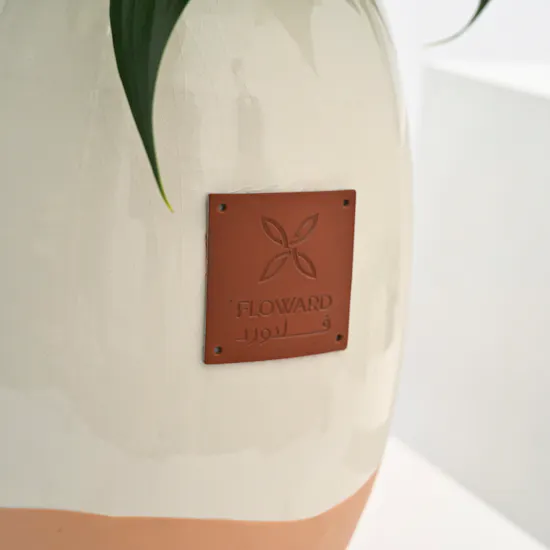 Lilies in Ceramic Vase