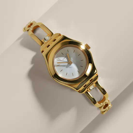 Swatch Inestima Gold Tone Women’s Watch