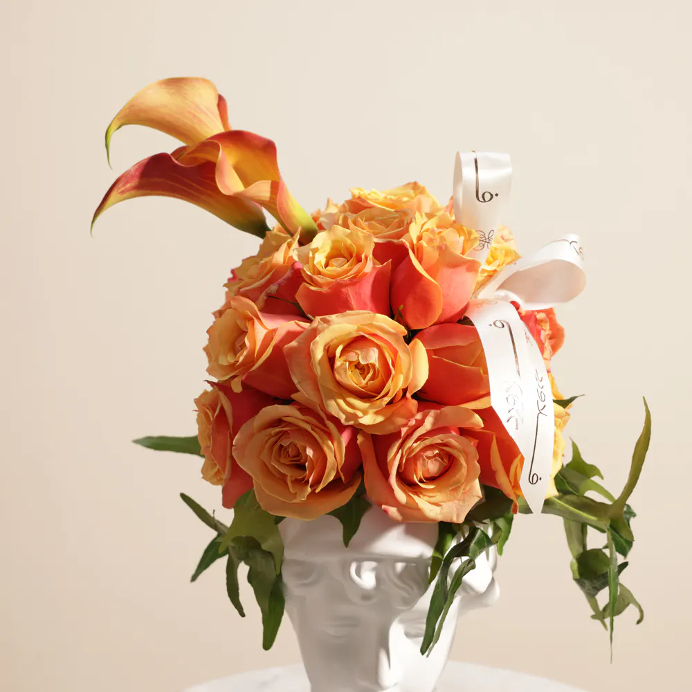 Buy and send Radiant Orange Aura Flower Vase gift Online in Riyadh