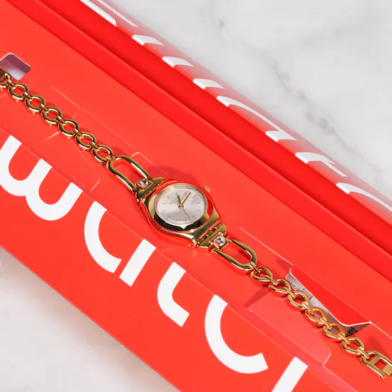 Swatch Inestima Gold Tone Women’s Watch