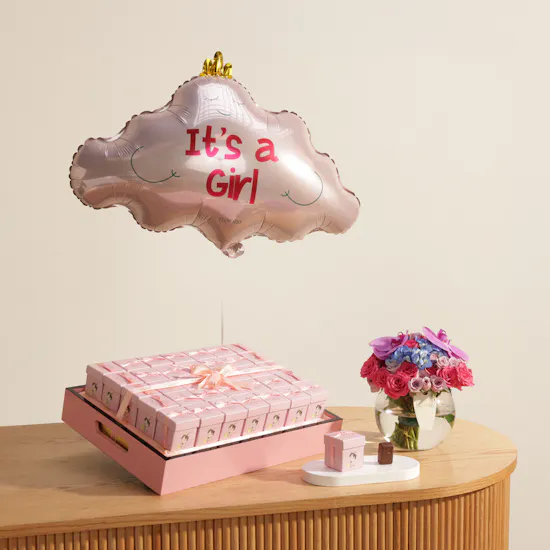 Godiva Baby Girl Chocolates with Flowers Beneath a Pink Cloud
