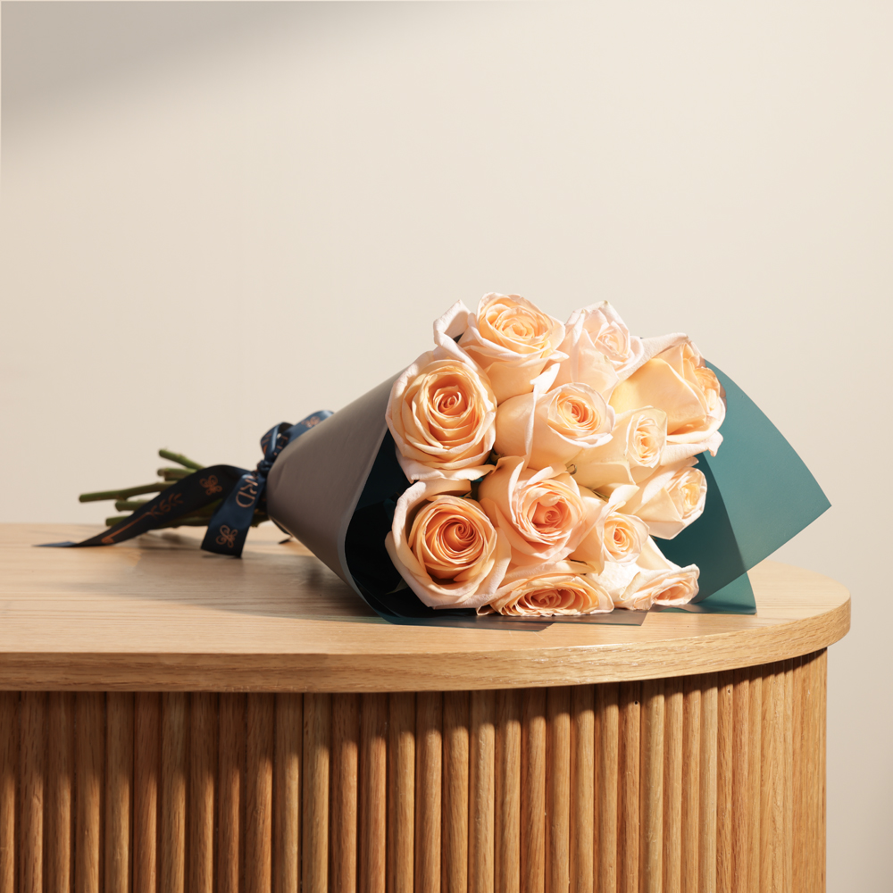 باقة جوري برتقالي فاتح ساحر | 12 جوري