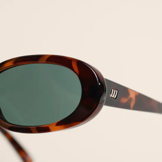 Le Specs Outta Love Oval Tort Green Mono Unisex Sunglasses