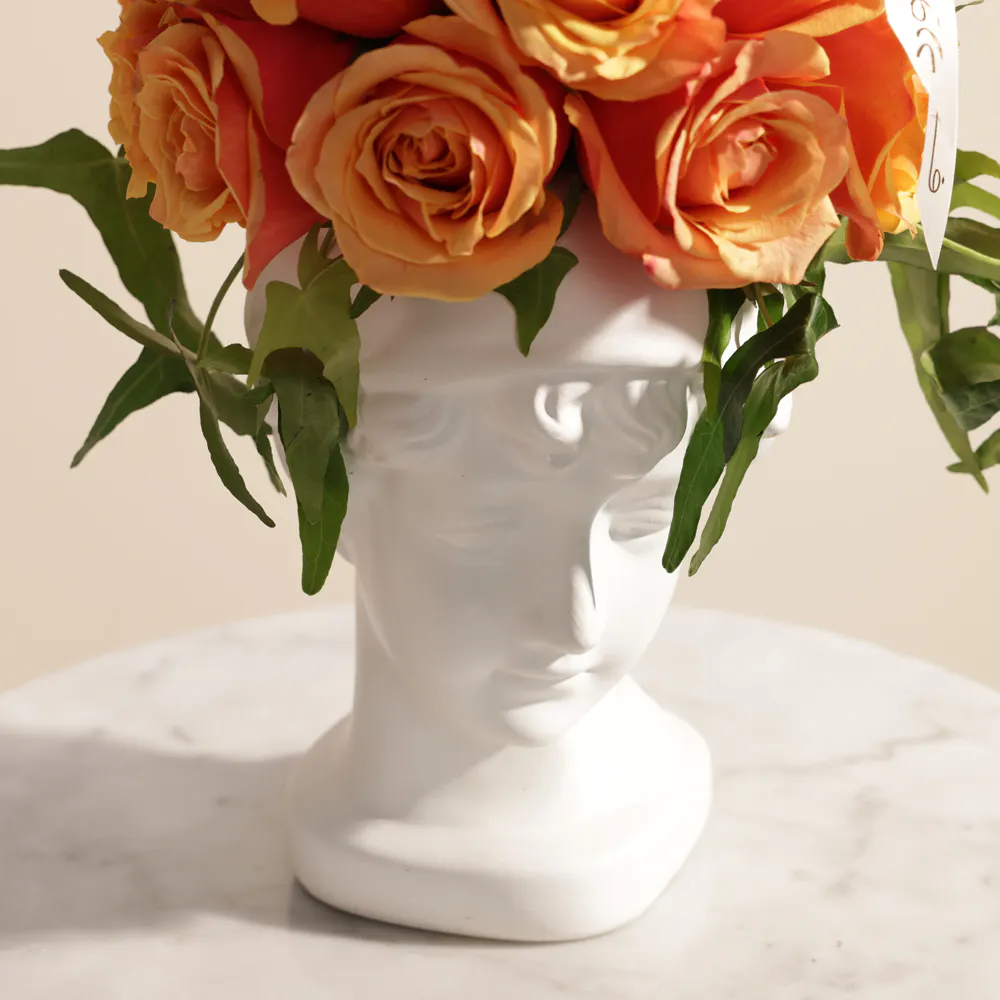 Buy and send Radiant Orange Aura Flower Vase gift Online in Riyadh