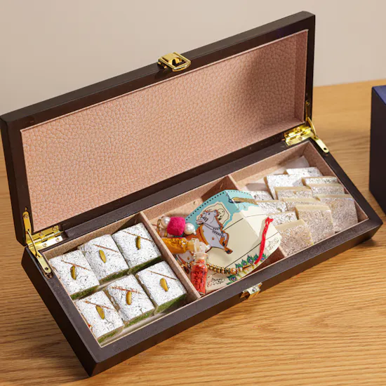 MyGovindas Rakhi Small Assorted Sweets Wooden Hamper | Scented Petals Flowers