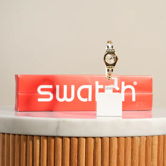 Swatch Inestima Gold Tone Women’s Watch
