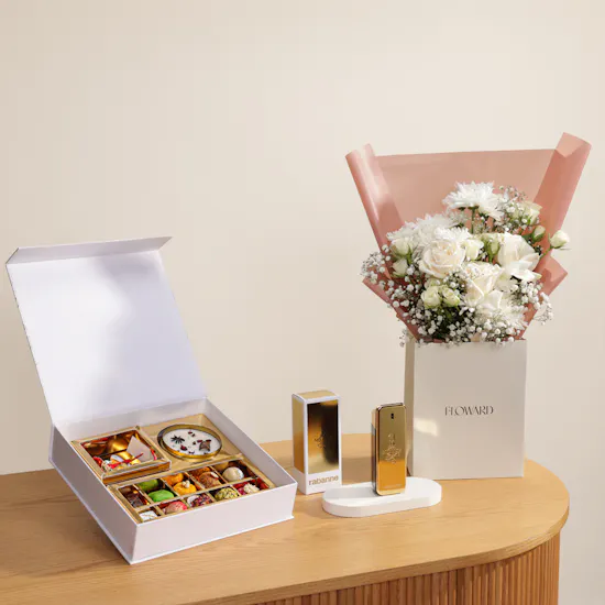 MyGovindas Rakhi Divine Bond Sweets Box | Paco Rabanne Parfum and Flowers