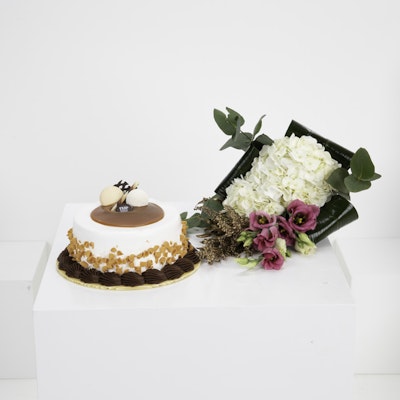 Baskin Robbins Praline Choco Pleasure Cake with Fascinating Floral Hand Bouquet