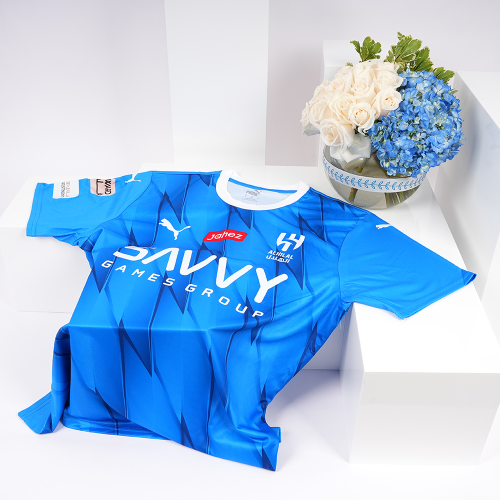 تيشيرت الهلال فئة الجماهير 23/24  وسط | مزهرية الأناقة