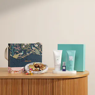 MyGovindas Rakhi Mixed Sweets Hamper | Acqua Dell'Elba Blu Gift Set for Men