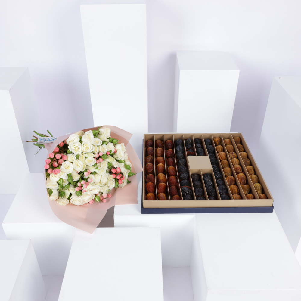 علبة هدايا تمور فاخرة من نوا 1 كجم | زهور مشرقة