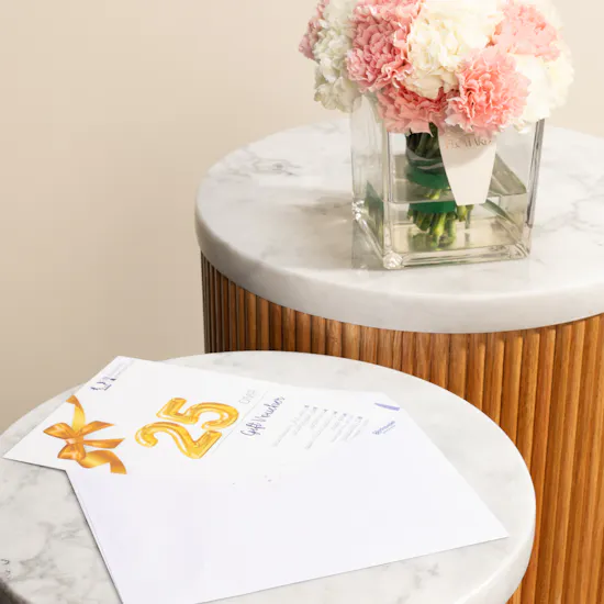 Eva Clinic Voucher 25 OMR | Carnation Vase