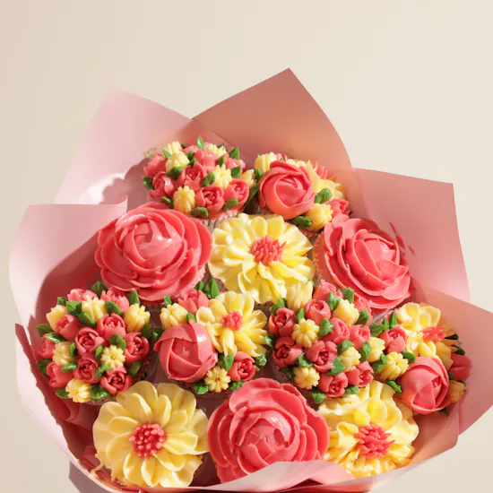 Carolina Herrera La Bomba Women's EDP | Gourmet Artistry Pink and Yellow Floral Cupcake Bouquet