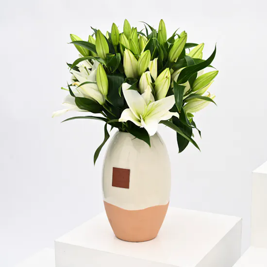 Lilies in Ceramic Vase