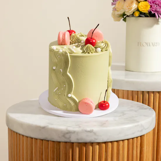 Floward Striking Omani Women's Day Green Cake and Balloon | Petals of Grace