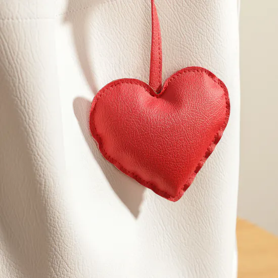 Glossy Touch White Leather Bag with Red Heart Charm