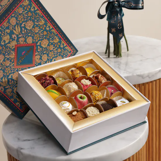 MyGovindas Fancy Sweets Medium Premium Box | Sunlit Moments Flower Bouquet