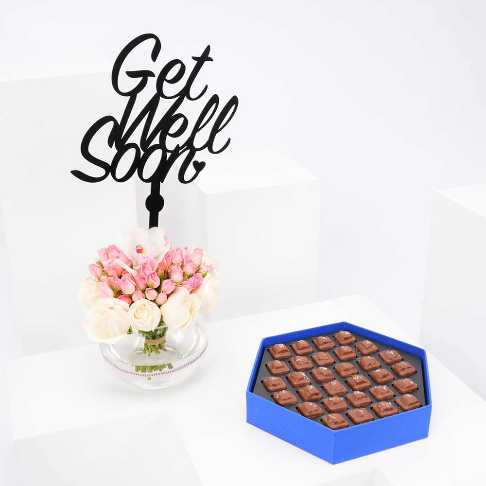 شوكولاتة البيكان من هنوفيرين مع فازة ورد الحمدلله على السلامة