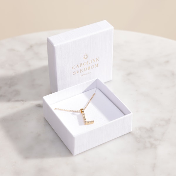 Buy and send Caroline Svedbom Mini L Letter Crystal Necklace gift