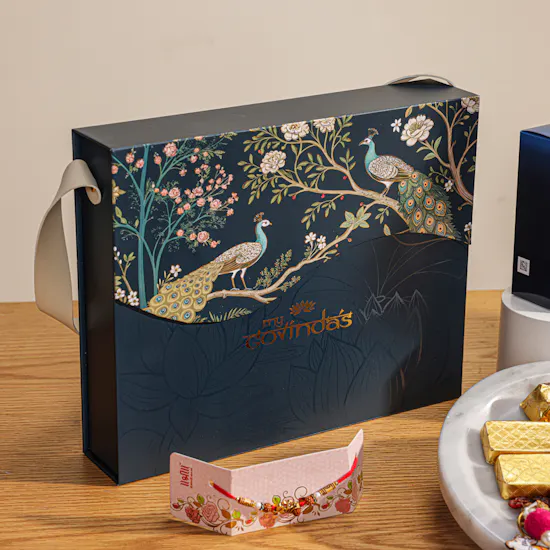 MyGovindas Rakhi Mixed Sweets Hamper | Fragrant Celebration Perfume and Flowers