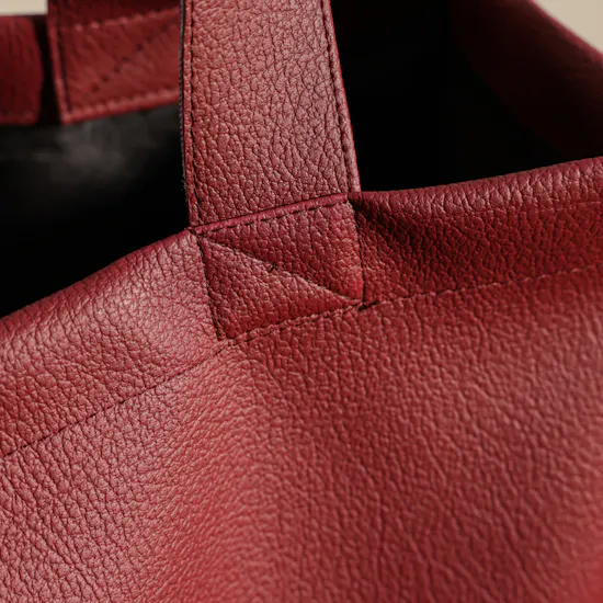 Glossy Touch Burgundy Omani Women’s Day Leather Bag