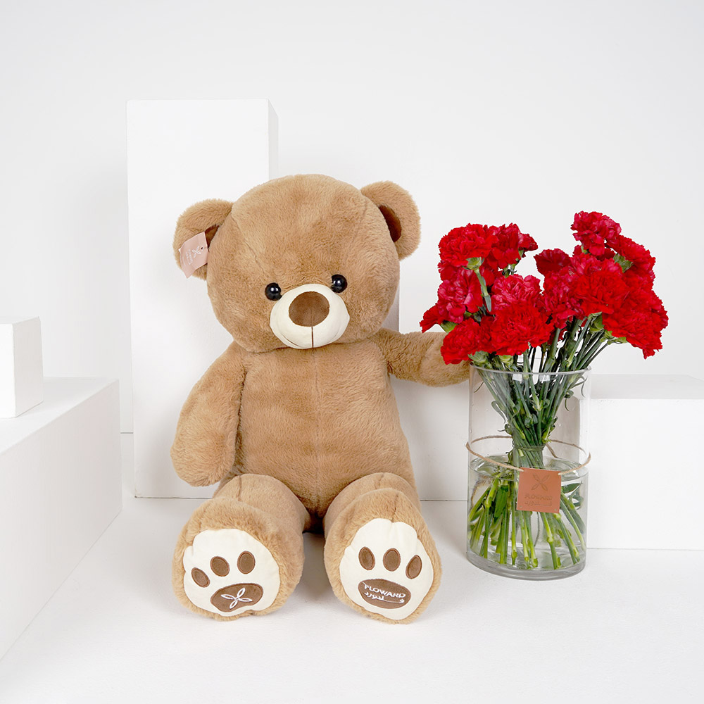 كرنيشن احمر مع فازة اسطوانية متوسطة و دمية دب متوسطة