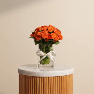 Warm Orange Baby Roses Vase | 18 Flowers